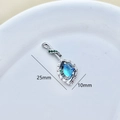 Silver teardrop pendant with blue and green zircons measuring 25mm in height - Silver-Blue Zircon