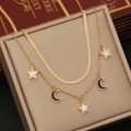 Double-layered gold necklace with star and moon pendants on elegant jewelry box - Style 2 Star and Moon