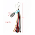 Western style leather tassel keychain with silver feather pendant and turquoise beads - Leaf