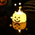 Detail of a glowing Halloween LED pumpkin candle with warm yellow light on reflective surface - White Pumpkin Style