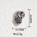 Macro view of vintage silver lobster clasp with carved sunflower and geometric patterns - Vintage Silver Sunflower Clasp