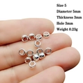 Close-up of 5mm silver alloy spacer beads for DIY jewelry with hole diameter 3mm - 5# (Diameter 5mm/Thickness 3mm)