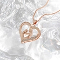 Rose gold heart pendant necklace with mother-child relief and sparkling cubic zirconia - Rose Gold