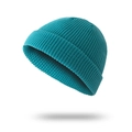 Short turquoise ribbed knit docker hat for men in minimalist urban streetwear style - Teal