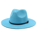 Detail of bright blue straw sun hat showing fine woven texture and black leather strap - M (56-58cm) / Lake Blue