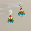 Detail of handmade beaded Christmas tree earrings with colorful crystals and snowflake studs - Snowflake Christmas-Padded Clip / Clip-On Earrings