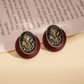 Detailed view of vintage oval portrait earrings with deep red resin and bronze relief - Silver Earring Post - Red