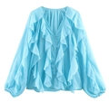 Detailed view of light blue ruffled chiffon shirt featuring layered V-neck and button closure - XS / Sky Blue