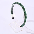 Handmade headband featuring green crystal beads and gold accents on a black base - Green + Gold
