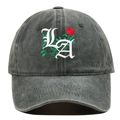 Detailed embroidery of gothic LA lettering and red rose on vintage washed baseball cap - Green