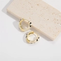 Minimalist gold hoop earrings with white enamel evil eye pattern on beige stone - White