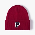 Deep burgundy knitted beanie with letter P patch and vertical ribbed texture - Burgundy