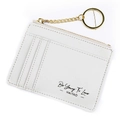 White textured leather card holder with zipper and golden keychain featuring script text - Light Gray