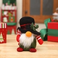Gnomo de Navidad con sombrero negro, cuerpo de fieltro verde y detalle de bastón - Estilo de sombrero negro