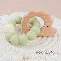 Silicone bead baby teether bracelet with hedgehog beech wood pendant in light green - Hedgehog/Light Green Beads