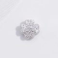Detailed macro view of S925 sterling silver four-leaf clover earring with sparkling zircon - Platinum Color Four Leaf Clover Bead