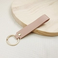 Minimalist pink leather keychain with lychee texture and gold metal ring accessory - No.11 Pink
