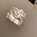 Détail d'un bracelet manchette argenté ajouré avec textures de flammes et fermoir - 88# Style Creux Aile de Flamme / Argenté
