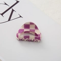 Detail of a purple and cream checkered hair claw clip showing its unique curved texture - Purple Large Checkerboard 4.5cm