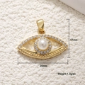 Detailed view of gold eye pendant with white pearl and zircons, size 17x20mm and 1.3g weight - Pearl Eye 03