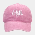 Close-up of pink washed denim baseball cap with white Gigi embroidery and fabric texture - Adjustable / Pink