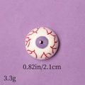 Detail shot of purple eyeball resin accessory with red veins for Halloween DIY crafts - Purple Iris Eyeball