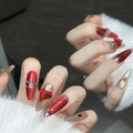 Oxblood red cat eye press-on nails with 3D heart gems and silver glitter accents - Long Oval Shape - Red Silver Cat Eye Heart Rhinestone / Extra Small (XS)