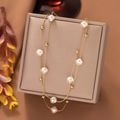 Elegant double-layered gold necklace with baroque pearls and geometric tassels - Flat Round Pearl (H1073) / Gold