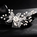 Silver bridal hair comb with elegant white faux pearls and sparkling rhinestone leaf design - Silver Hollow Petal Hair Comb (HS-J3350S)