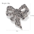 Vintage bow brooch with black rhinestones in silver finish, size 6.5cm by 6cm - Silver Bowknot (xz4136B)