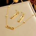 Luxurious gold U-shaped earring and necklace set with sparkling triple diamond pendants - Hollow Oval Triple Stone 2-Piece Set (N3110)