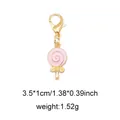 Pink lollipop charm pendant with gold lobster clasp and bow for bag or shoe decor - Style 27 Lollipop