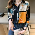 Women's casual button-up shirt with artistic collage print and abstract landscape patterns - S / Black Blue Abstract Print