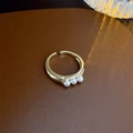 Gold plated open ring featuring three small pearls and elegant vertical groove textures - Gold Vintage Ribbed Three-Pearl Style