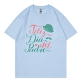Light blue crewneck t-shirt with colorful Feliz Dia del Padre print and cotton texture - XS / Tops / Light Blue (317)