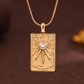 Golden tarot style rectangle pendant necklace with sunburst engraving and zircon stone - Gold (X6061GD)