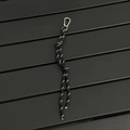 Close-up of black braided paracord lanyard with reflective dots and metal carabiner hook - Black