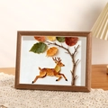 Artistic wooden frame with autumn leaf collage of a deer on a beige lace tabletop - 5 Inch / Walnut Color