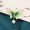 Elegant gold butterfly brooch with green wings, sparkling crystals and a pearl drop - Style 33/Green White Gradient Pearl
