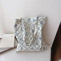 Detail of Toile de Jouy print canvas tote bag with classic blue floral and figure patterns - Retro Rhombus Blue And White Porcelain