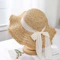 Detailed texture of hand-woven raffia sun hat with wide white lace bow ribbon - White Strap