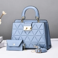 Fashionable light blue quilted leather handbag set with matching pouch and gold hardware - Blue