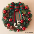 40cm Christmas wreath with red ornaments, pine cones, wooden reindeer and striped bow - 40cm Reindeer Wreath With Striped Bow