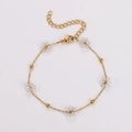 Golden stainless steel beaded bracelet featuring clear crystal floral charms and extender - Transparent-Bracelet