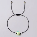 Bracciale in corda nera regolabile con perla a mela verde fatta a mano e oro - Mela Verde