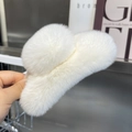Detailed close-up of a large white plush hair claw clip showing soft faux rabbit fur texture - Extra Large / White