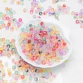 Mix of colorful frosted 6mm and 8mm glass beads in a white shell bowl for DIY jewelry - 8mm / Random Mixed Colors
