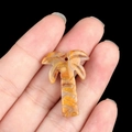 Natural yellow-brown agate palm tree pendant with unique marbled gemstone textures - Crazy Agate