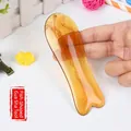 Amber resin fish-shaped scraping board for facial massage and meridian lifting - Fish Shape Massage Plate / Amber