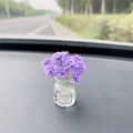 Miniature glass vase with purple artificial flowers on car dashboard for interior decor - Purple Gypsophila